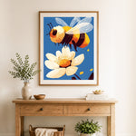 Finished bumblebee and daisy flower cross stitch artwork displayed as home decor