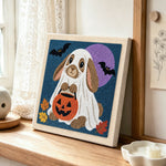 Bunny ghost costume punch needle artwork displayed on a table