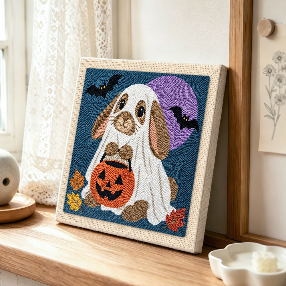 Bunny ghost costume punch needle artwork displayed on a table