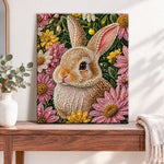 Finished bunny surrounded by wild daisies pearl diamond painting artwork displayed as home decor