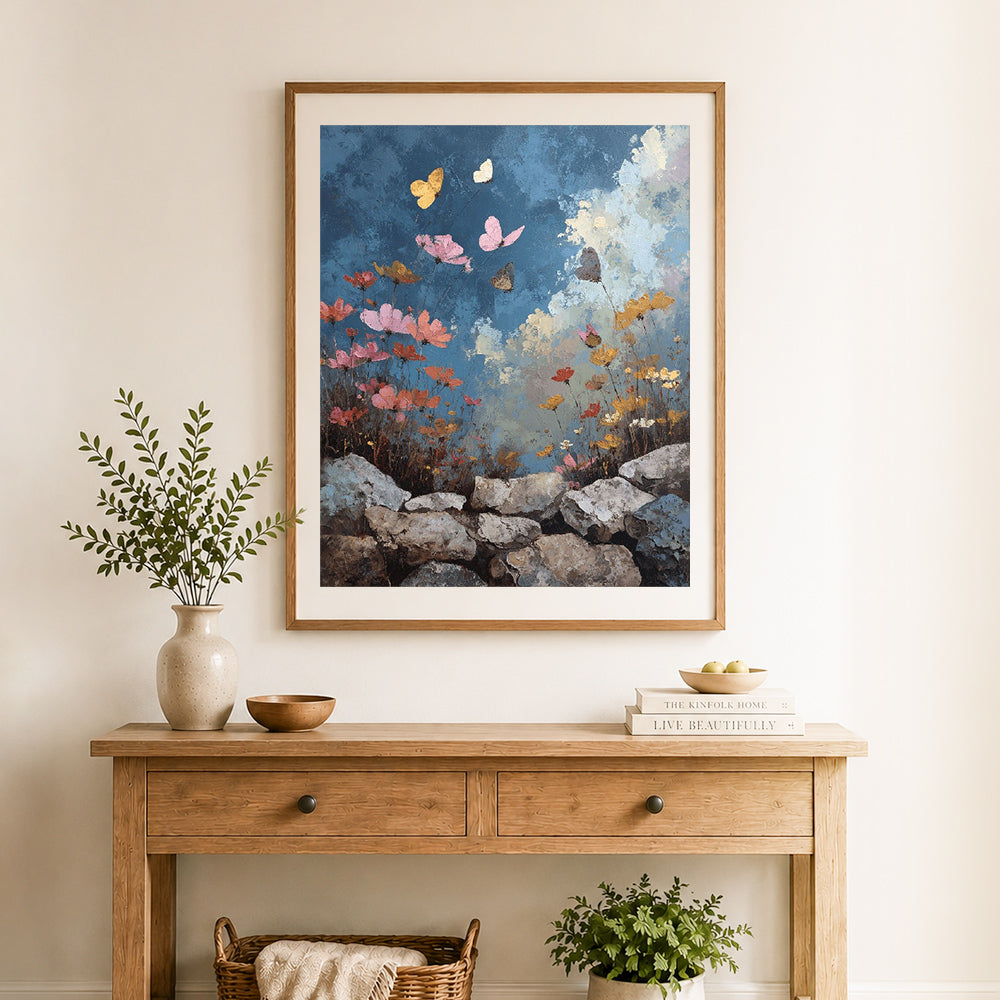 Finished butterfly wildflower scene cross stitch artwork displayed as home decor