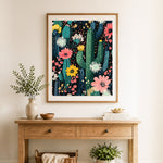 Finished cactus floral pattern cross stitch artwork displayed as home decor