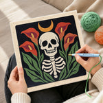 Creating handmade calla lily skull punch needle artwork
