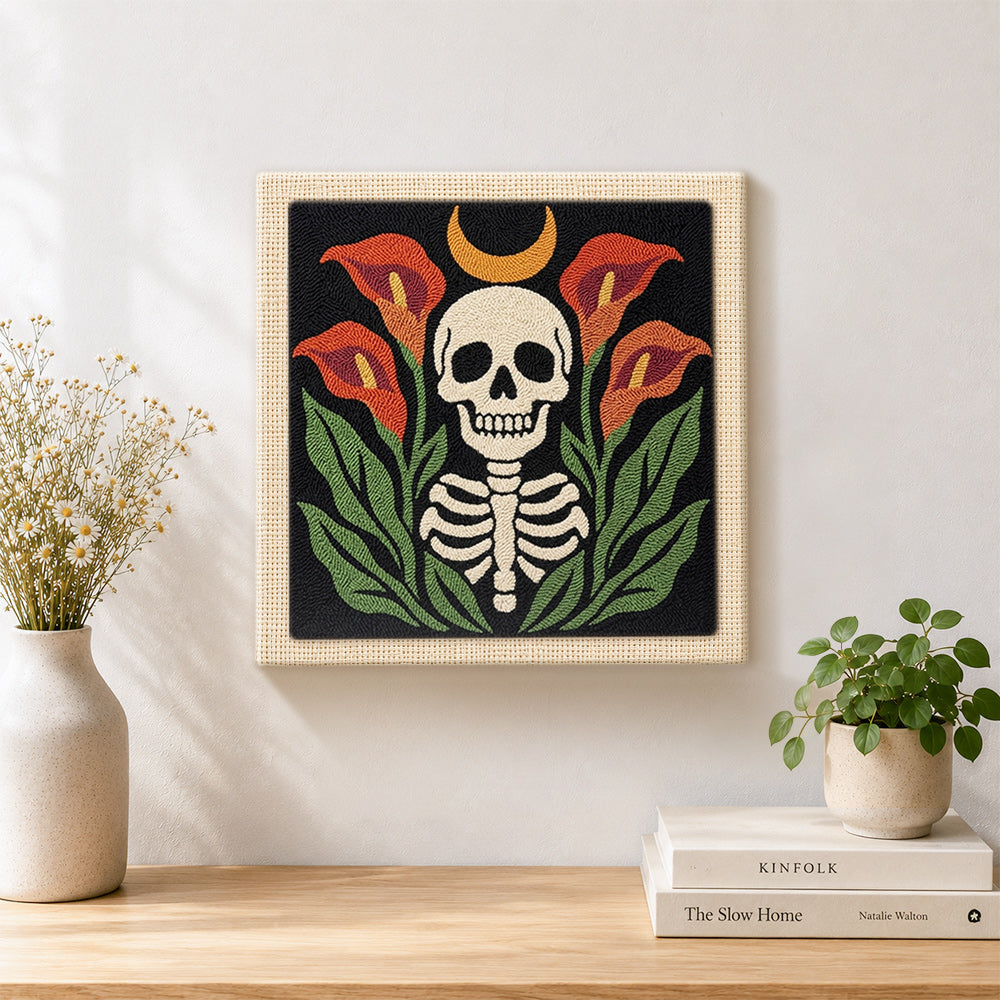 Finished calla lily skull artwork displayed on a wall