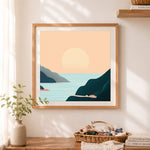 Finished calm coastal sunset view cross stitch artwork displayed as home decor
