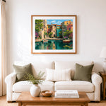 Finished canal waterfront homes cross stitch artwork displayed as home decor