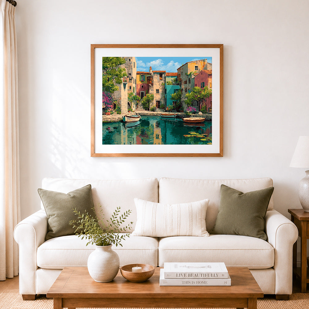 Finished canal waterfront homes cross stitch artwork displayed as home decor
