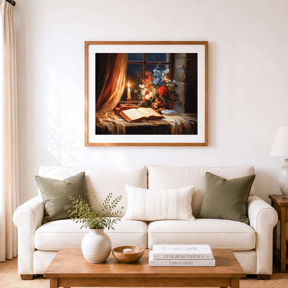 Finished candlelit floral book scene cross stitch artwork displayed as home decor