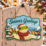 Candy cane frog greetings paint by numbers door hanger on a garden gate