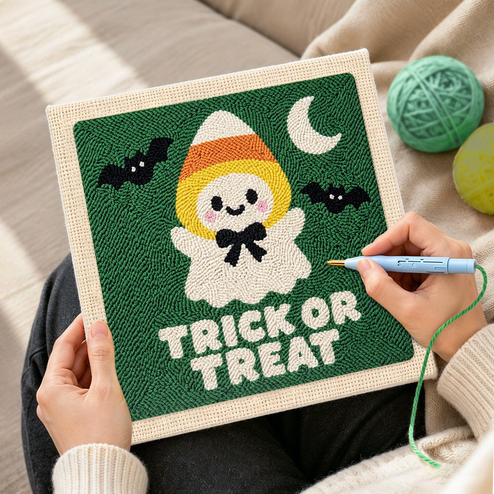 Creating handmade candy corn ghost punch needle artwork