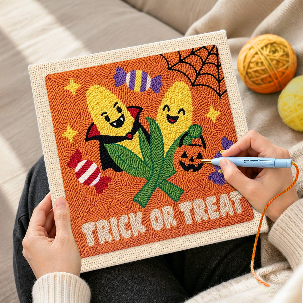 Creating handmade candy corn halloween pair punch needle artwork