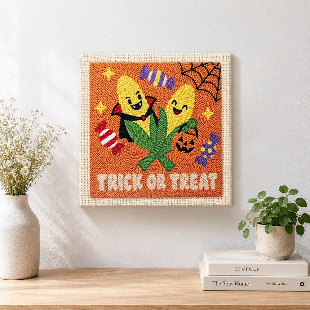 Finished candy corn halloween pair artwork displayed on a wall