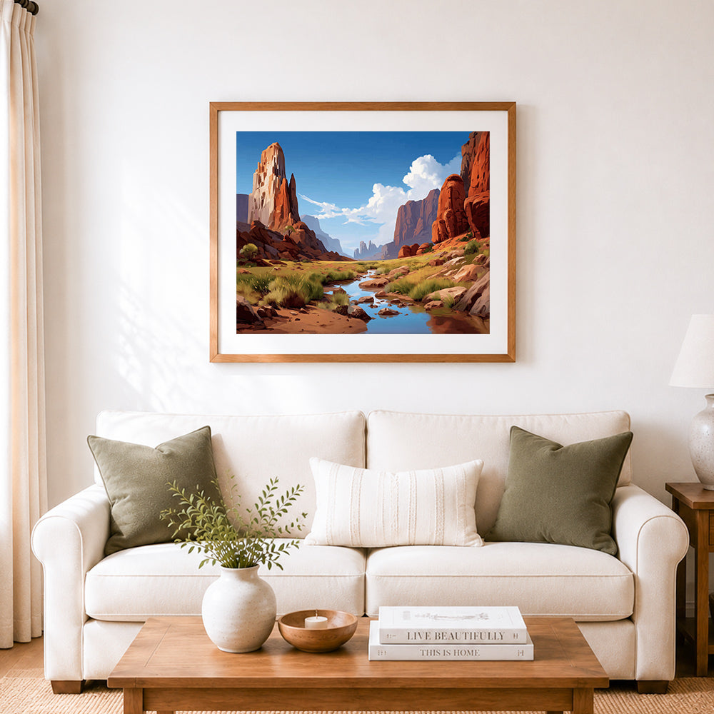 Finished canyon stream scenery cross stitch artwork displayed as home decor