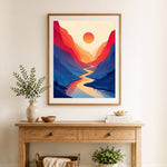 Finished canyon sunset river cross stitch artwork displayed as home decor