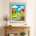 Finished cartoon countryside view cross stitch artwork displayed as home decor