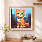 Finished cartoon orange kitten cross stitch artwork displayed as home decor