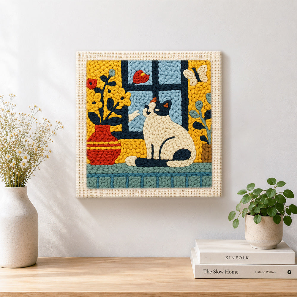 Finished cat and flower vase on windowsill artwork displayed on a wall