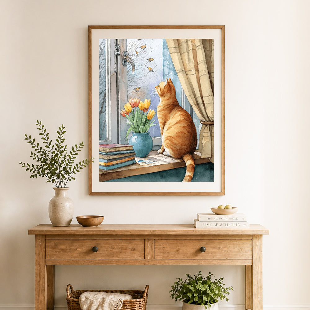 Finished cat watching birds cross stitch artwork displayed as home decor