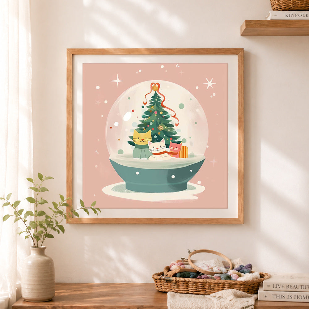 Finished cats christmas snow globe cross stitch artwork displayed as home decor