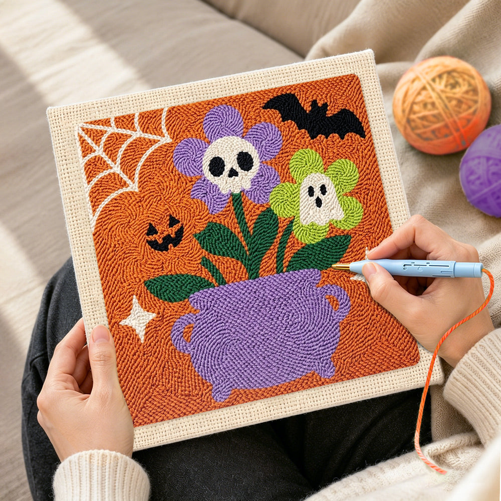 Creating handmade cauldron spooky blooms punch needle artwork