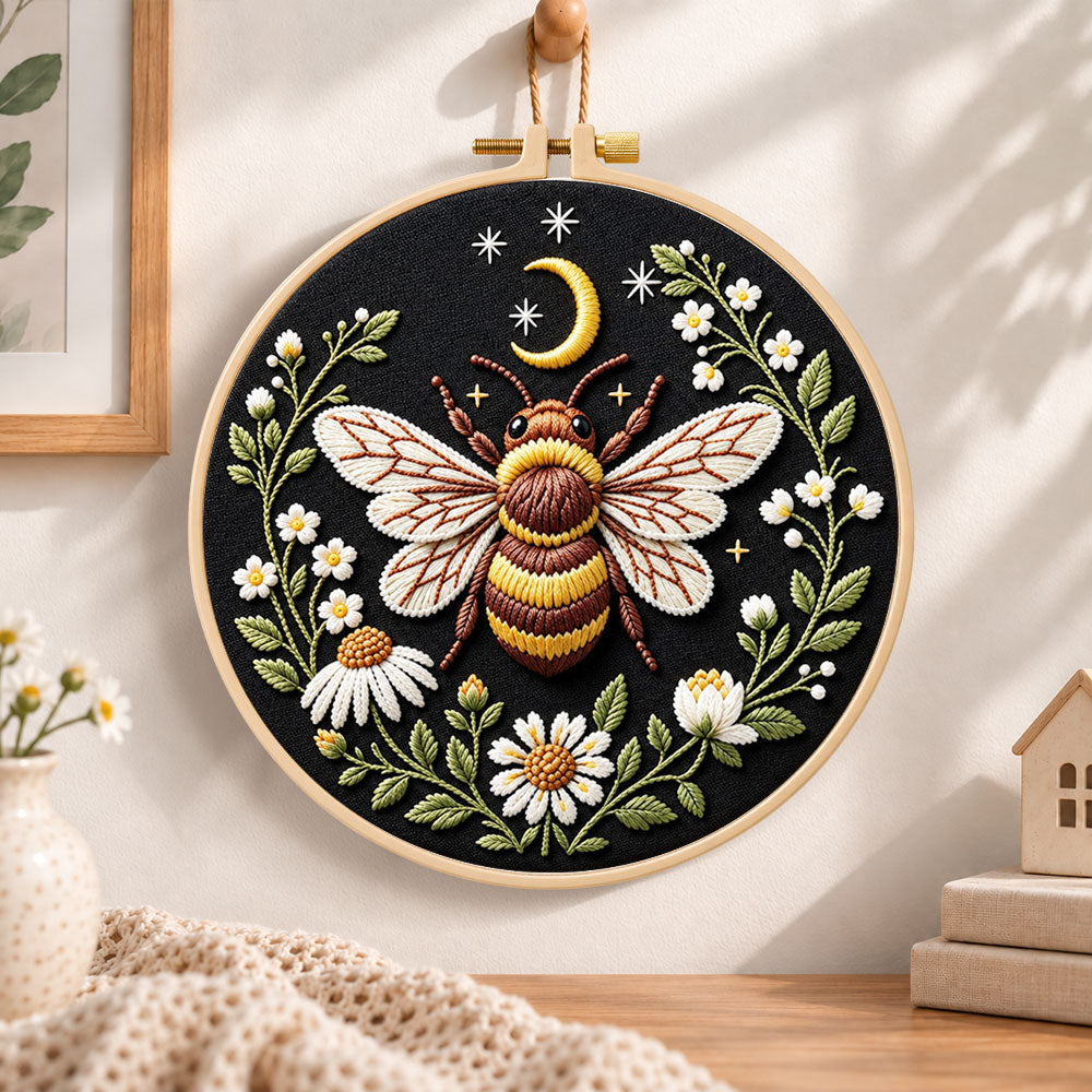 Celestial bee with daisies embroidery hoop wall art displayed as warm and cozy handmade home decor