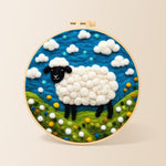 Charming black-faced sheep in sunny meadow needle felting kit for beginners with a round wooden frame