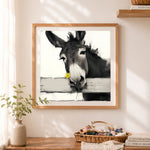 Finished charming donkey with yellow flower cross stitch artwork displayed as home decor