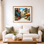 Finished charming european flower market alley cross stitch artwork displayed as home decor