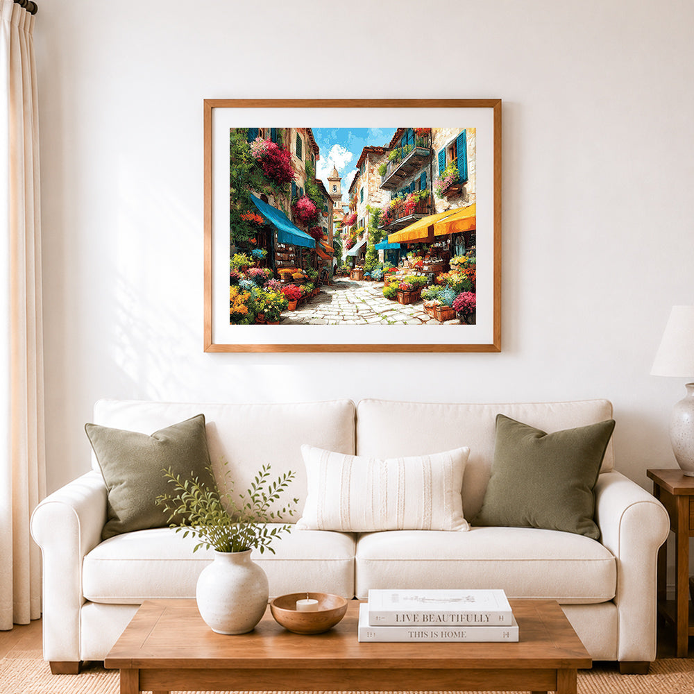 Finished charming european flower market alley cross stitch artwork displayed as home decor
