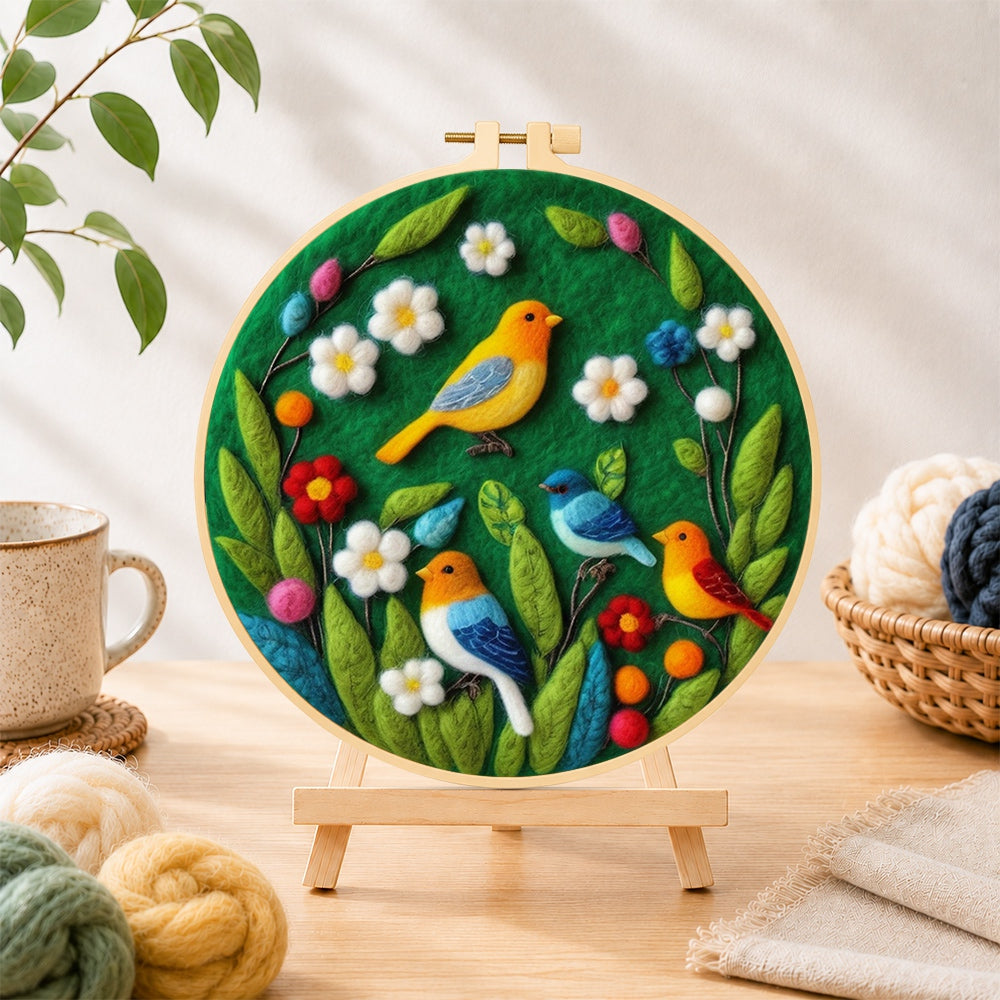 Finished charming flock of colorful birds needle felting displayed on a wooden easel