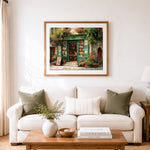 Finished charming green bookshop with colorful flowers cross stitch artwork displayed as home decor