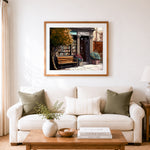 Finished charming old bookstore cross stitch artwork displayed as home decor