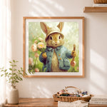Finished charming rabbit in blue coat cross stitch artwork displayed as home decor