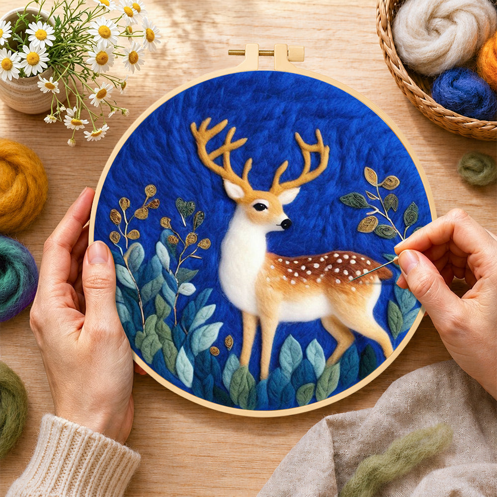 Creating the charming spotted fawn wool painting by hand with a felting needle