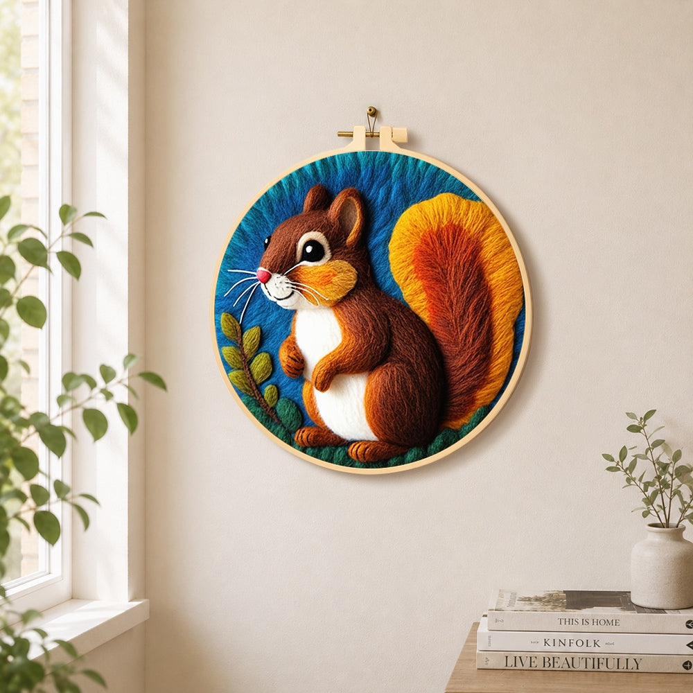Charming squirrel with fluffy tail needle felt wall art displayed in a bright home interior