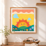 Finished cheerful rising sun cross stitch artwork displayed as home decor