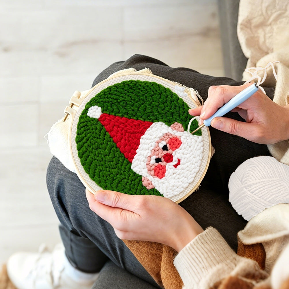 Creating handmade cheerful santa portrait unch needle artwork