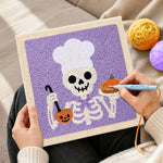 Creating handmade chef skeleton punch needle artwork