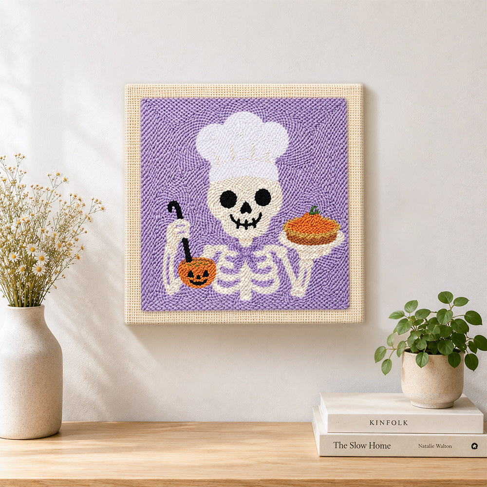 Finished chef skeleton artwork displayed on a wall