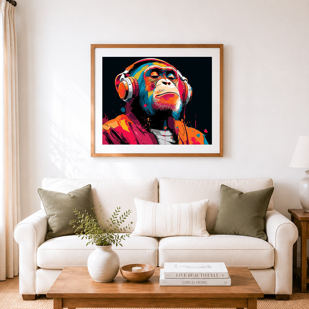 Finished chill gorilla enjoying music cross stitch artwork displayed as home decor