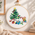 Christmas bear tree embroidery hoop wall art displayed as warm and cozy handmade home decor
