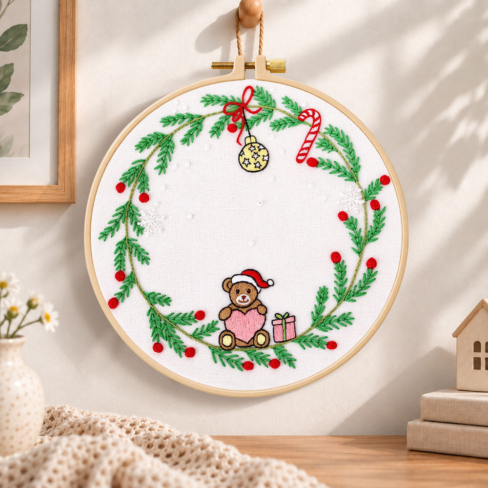 Christmas bear wreath embroidery hoop wall art displayed as warm and cozy handmade home decor