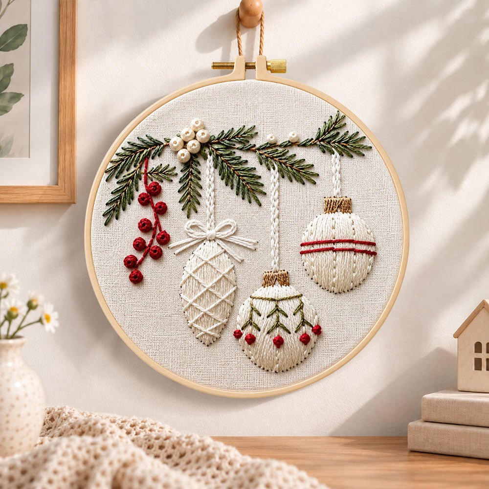 Christmas ornament embroidery hoop wall art displayed as warm and cozy handmade home decor