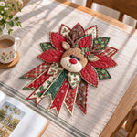Christmas reindeer handmade quilted bow displayed on a table as seasonal home decor