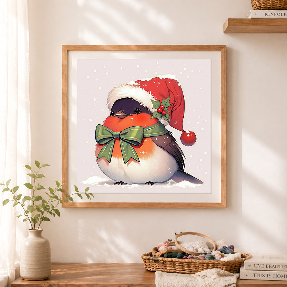 Finished christmas robin bird cross stitch artwork displayed as home decor