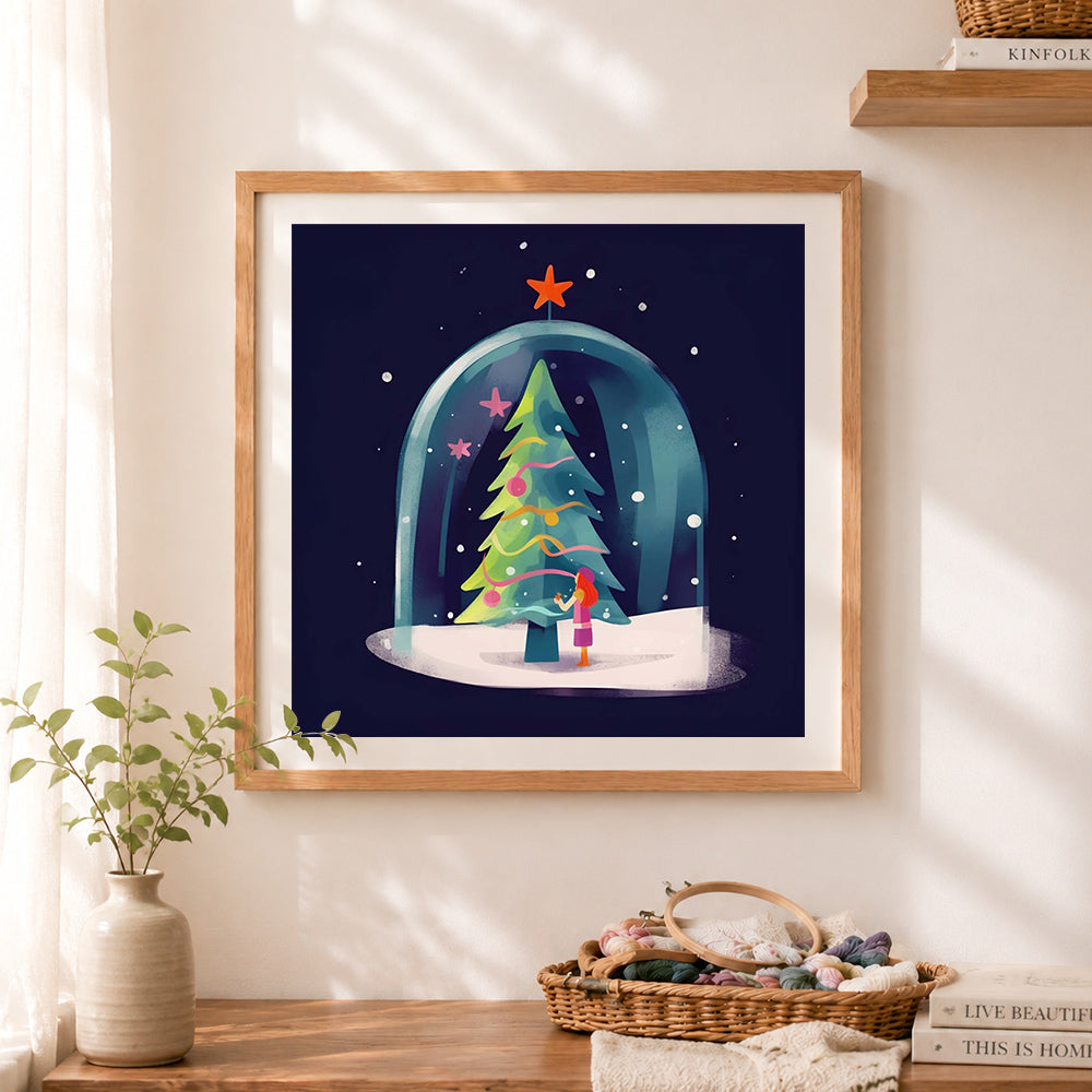 Finished christmas snow globe scene cross stitch artwork displayed as home decor