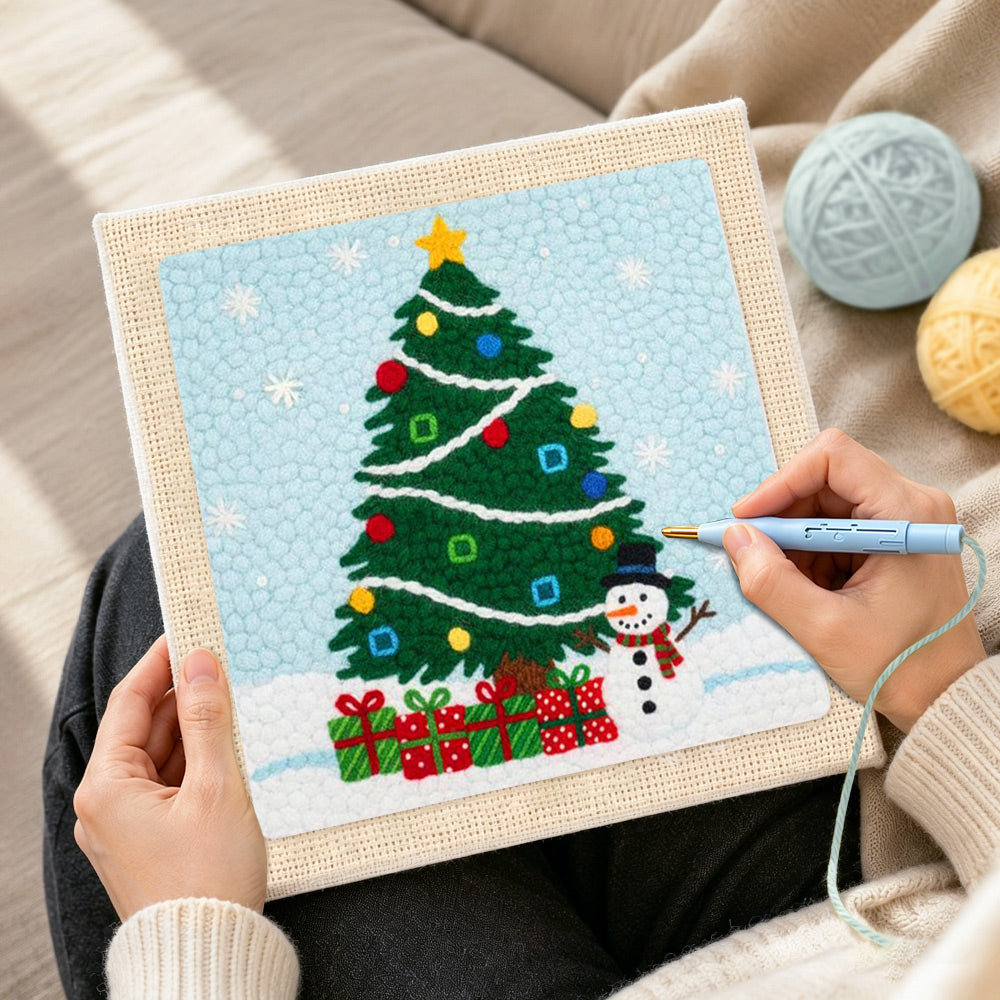 Creating handmade christmas tree and snowman punch needle artwork