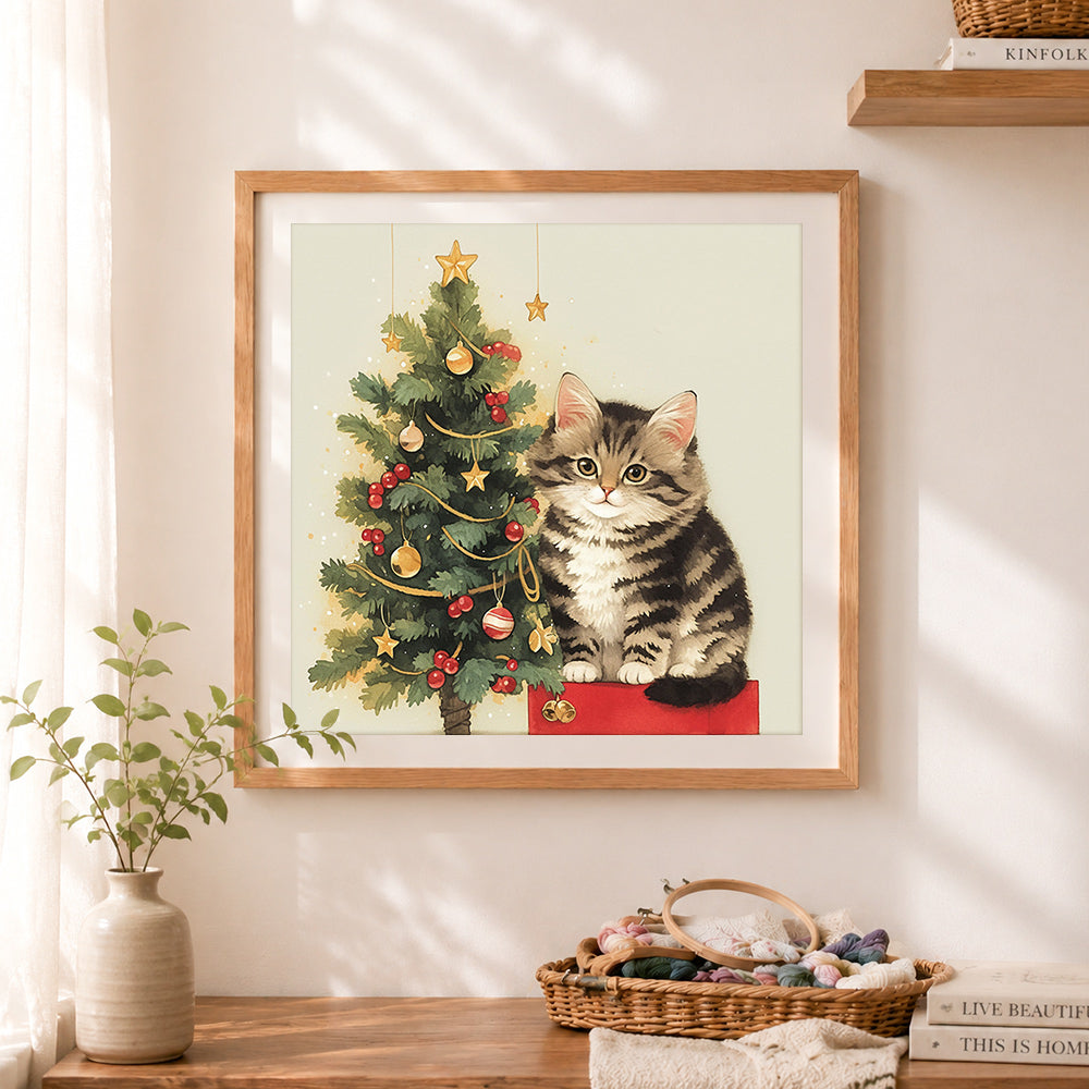 Finished christmas tree kitten cross stitch artwork displayed as home decor