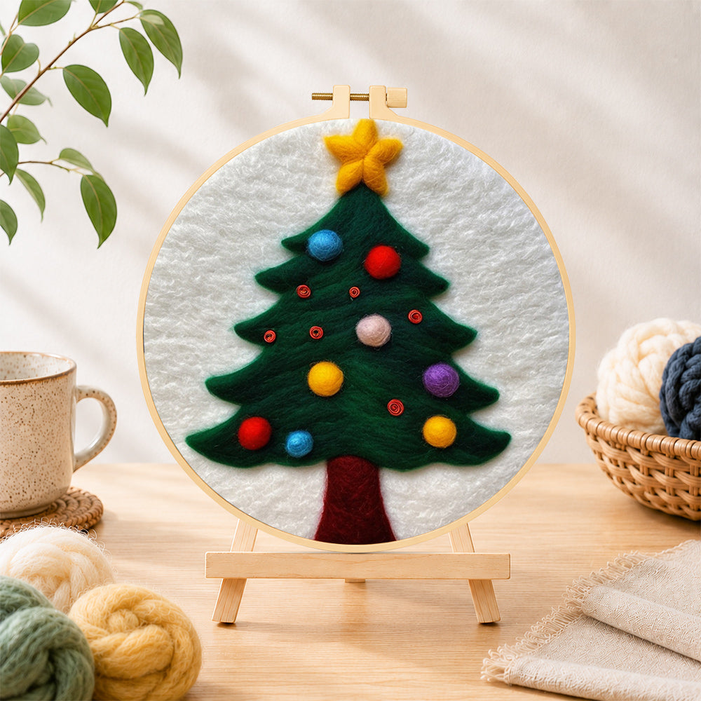 Finished christmas tree with colorful baubles needle felting displayed on a wooden easel