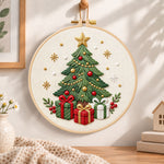 Christmas tree with gifts embroidery hoop wall art displayed as warm and cozy handmade home decor